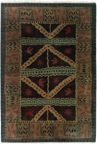 Sundial chocolate - a handmade wool rug with primitive and pleasing shapes and patterns, and richly deep colors.