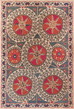 Sun Palace Soumak Rug- this handmade oriental rug with bright illustrated suns
