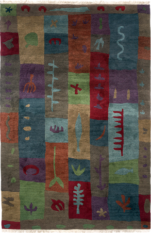 Blockprint is a colorful and fun hand-spun Tibetan wool rug designed by Laurie Downing.