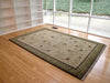 Tibetan Sun (sage)  - modern area rug in room